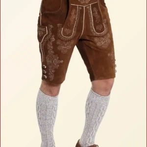 Iconic German outfits include lederhosen for men and dirndls for women, both of which are traditional Bavarian clothing often worn at cultural events and festivals.