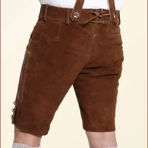 Iconic German outfits include lederhosen for men and dirndls for women, both of which are traditional Bavarian clothing often worn at cultural events and festivals.